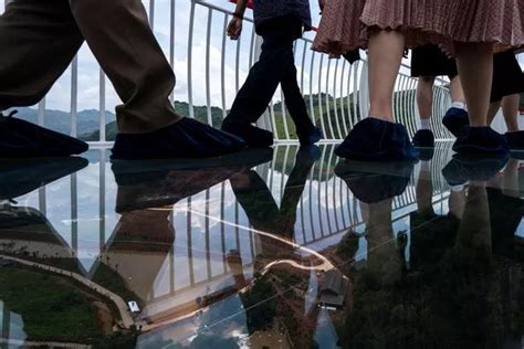 Tourists Take Pulse Racing Snaps On Terrifying Record Breaking Glass