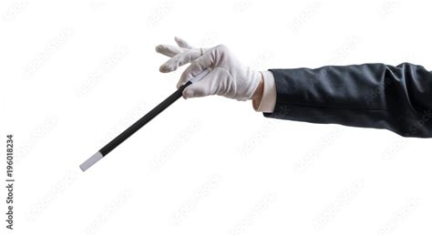 Magician hand is holding magic wand. Isolated on white background ...