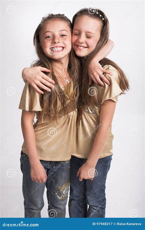 Two Girls Hugging