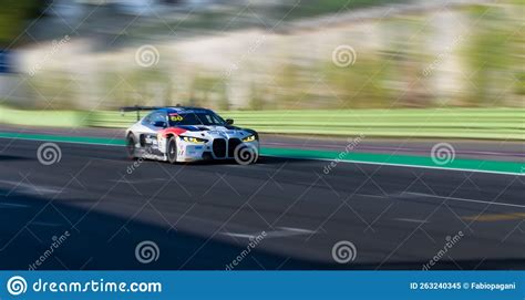 Spectacular Scenic Racing Car On Asphalt Racetrack Bmw M4 Blurred