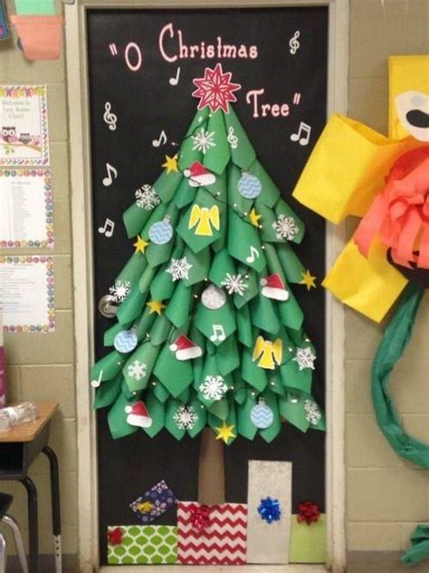 A Christmas Tree Made Out Of Rolled Up Paper On The Door To A Classroom