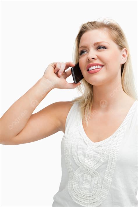 Woman Chatting Joyfully On The Phone While Standing Upright Photo