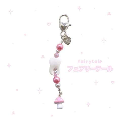 A Pink And White Beaded Key Chain