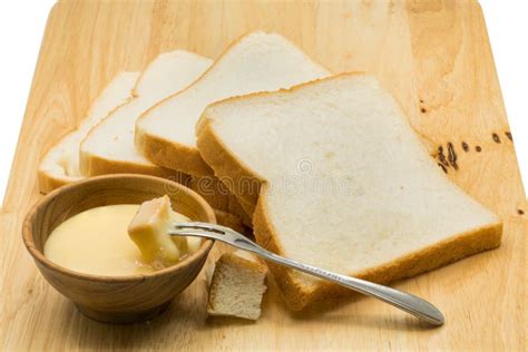 Portion Of Bread Dip In Sweetened Condensed Milk Stock Image Image Of Close Loaf 82858053