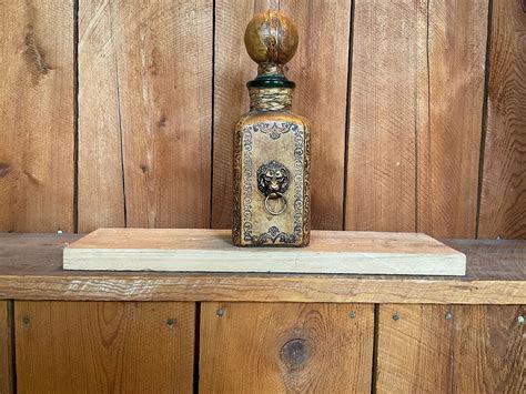 Vintage Square Leather Decanter With Brass Lion Head On Front Mid