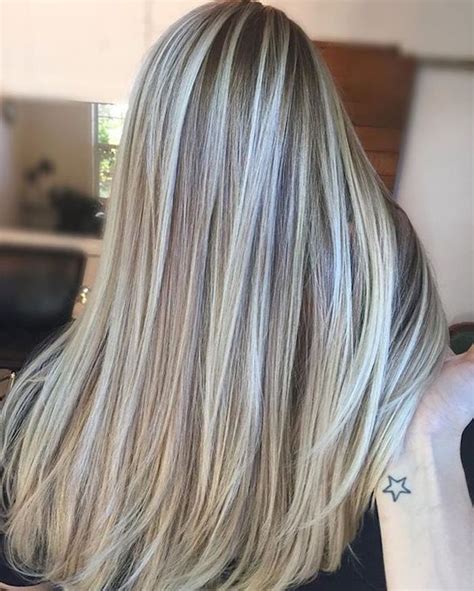 Platinum Blonde Highlights On Long Brunette Hair Straightened And