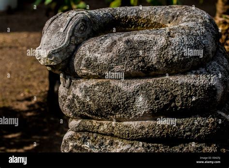 Mayan stone snake Stock Photo - Alamy