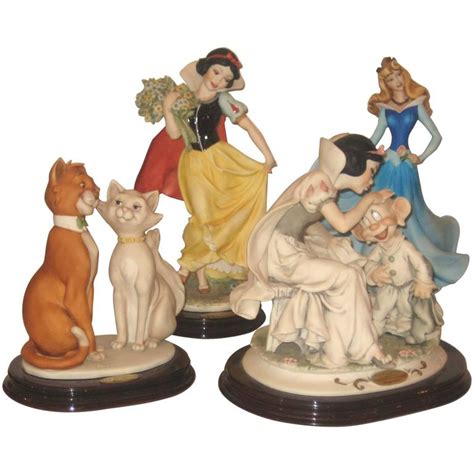 Collection Of Four Giuseppe Armani Disney Character Figurines At 1stdibs