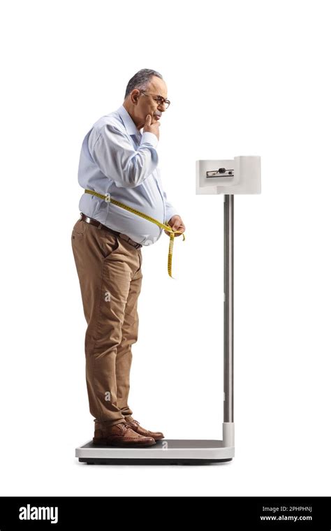 Full Length Shot Of A Pensive Mature Man Standing On A Weight Scale And