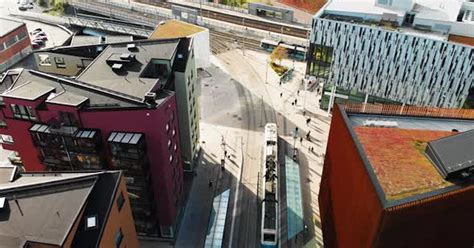 Aerial top down view trams crossing rail tracks at Gamlestaden tram ...