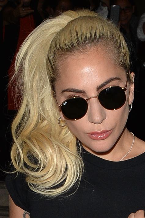 Lady Gaga Wavy Platinum Blonde Dark Roots High Ponytail Ponytail Hairstyle Steal Her Style