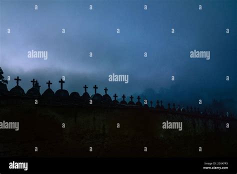 Creepy Spooky Graveyard Atmosphere In The Cemetery With Tombstone And