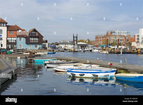 lymington harbour lymington hampshire uk  boats  buildings