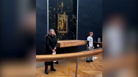 Watch: Protesters throw soup at the glass in front of the 'Mona Lisa'