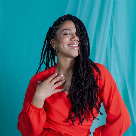 Woman with Braided Hair Smiling · Free Stock Photo