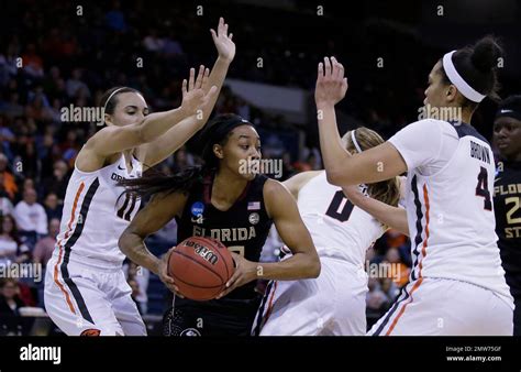 Florida State Forward Ivey Slaughter Center Is Triple Teamed By