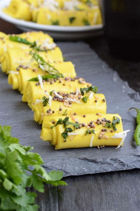 Khandvi is a popular Gujarati snack made using buttermilk and chickpea flour. Here is a recipe ...