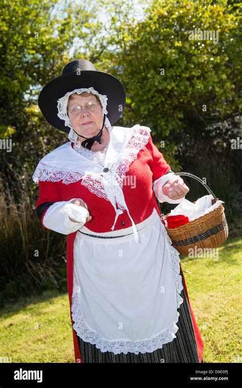 A Woman Dressed In Traditional Welsh Costume Selling Old Fashioned