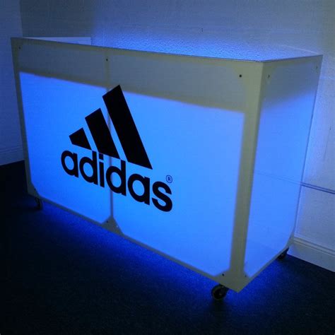 White DJ Booth Rental With LED Lighting and Logo Branding - DJ Peoples