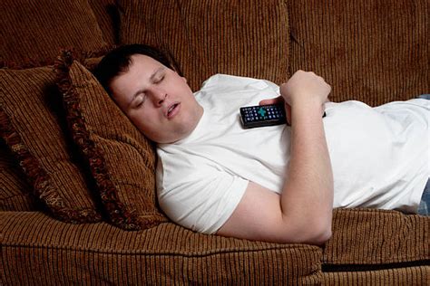 Lazy Guy On Couch Stock Photos Pictures And Royalty Free Images Istock