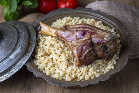 Turkish Foods Lamb Shank Tandoori On Bulgur Wheat Rice Turkish Name Bulgur Bugday Pilavi Kuzu