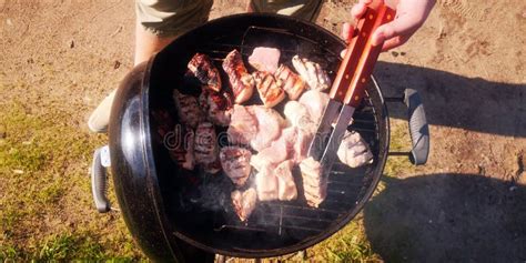 Man Flips Meat Skewers At Summer Barbecue Stock Photo Image Of Tender