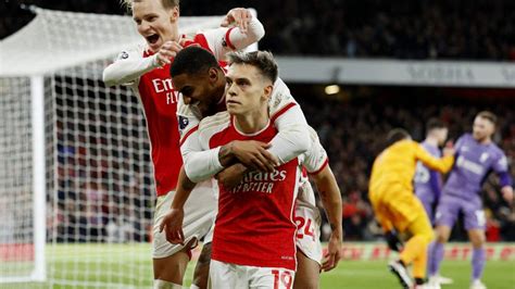 Arsenal Beat Liverpool 3 1 To Keep Title Dream Alive