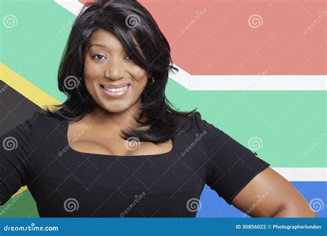 Portrait Of Casual Mixed Race Woman Against South African Flag Stock ...