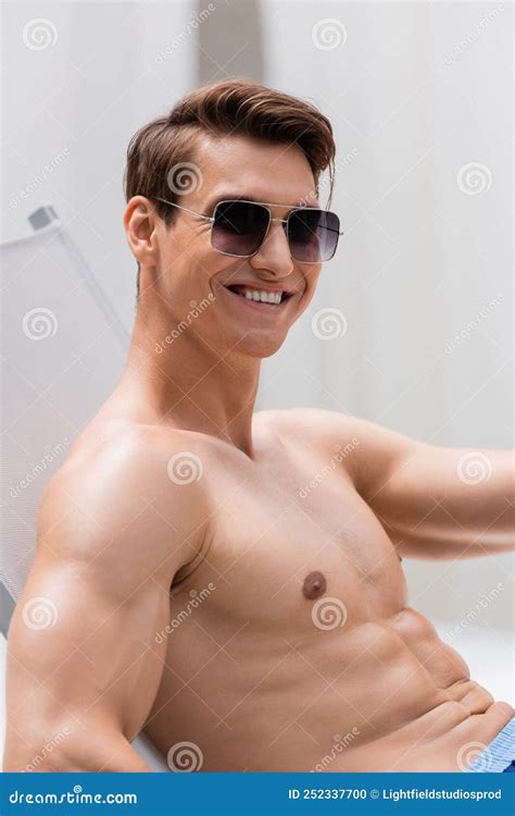 Shirtless Man In Sunglasses Smiling At Stock Photo Image Of Relax