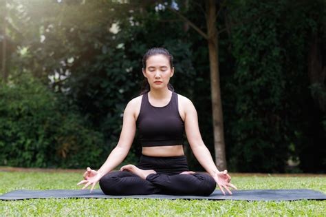 Premium Photo Asian Woman Practicing Yoga In Root Bond Mula Bandha