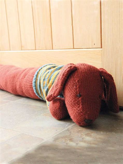 Cozy up your home with this DIY draught excluder knitting pattern