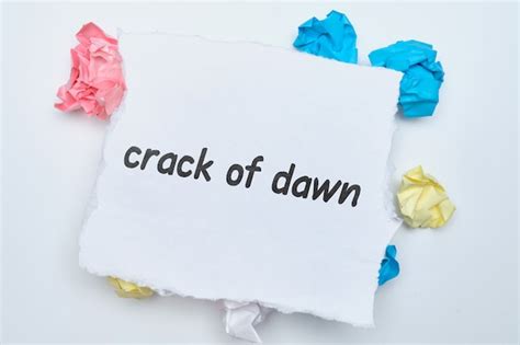 Premium Photo Crack Of Dawn English Idiom Hand Lettering On Wooden