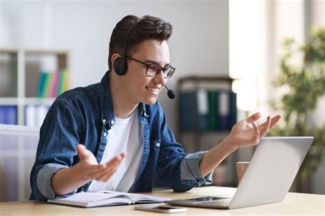 Premium Photo Online Meeting Man In Headset Making Video Conference