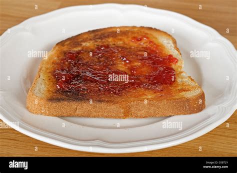 Strawberry Jam On Toast Stock Photo Alamy