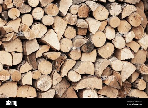 A Supply Of Split And Dried Hardwood Logs Stacked Up And Ready For A