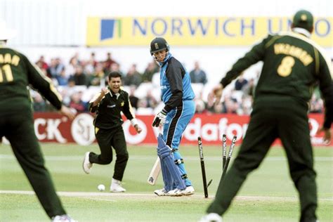 Ben Hollioake Hurries Off The Field As The Fans Invade The Pitch