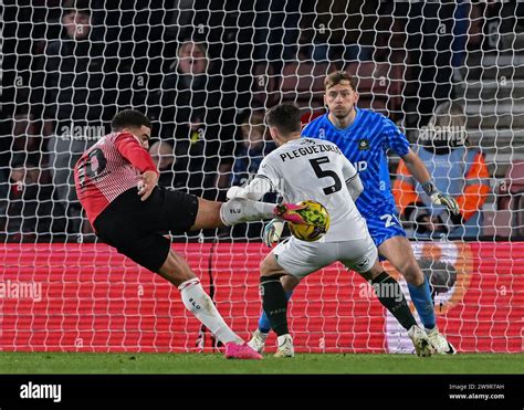 Che Adams Of Southampton Takes A Shoot And Is Blocked By Julio