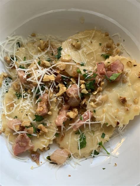 Pasta With Ham And Parmesan Cheese In A White Bowl