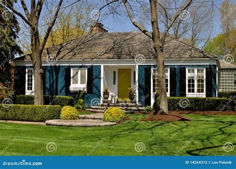 Blue House With Nice Landscaping Stock Photos - Image: 14244313