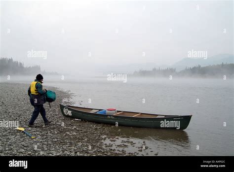 Loading Up The Canoe Teslin River Yukon Canada Stock Photo Alamy