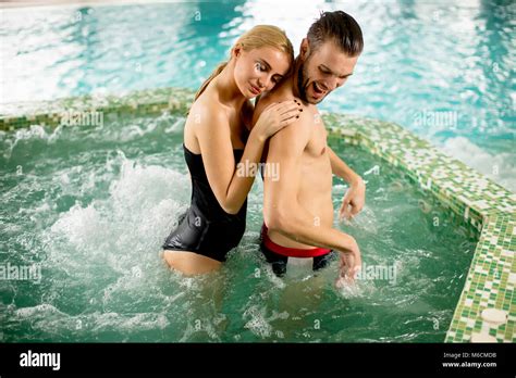 Loving Couple Relaxing In Hot Tub In Spa Stock Photo Alamy
