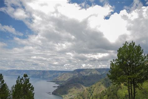 Lake Toba and volcano stock image. Image of island, village - 40533061