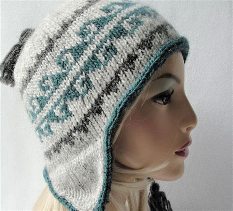 A Mannequin Head Wearing A Knitted Hat