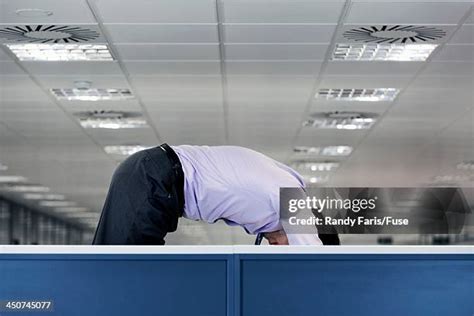 Peering Over Cubicle Photos And Premium High Res Pictures Getty Images