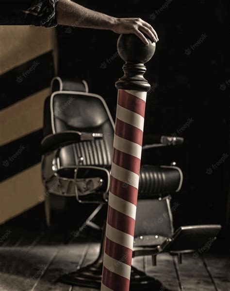 Logo of the barbershop symbol stylish vintage barber chair barbershop