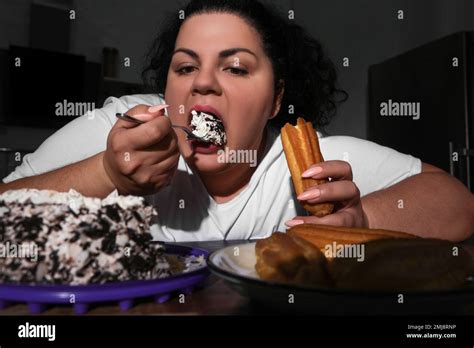 Binge Eating Obese Woman Hi Res Stock Photography And Images Alamy