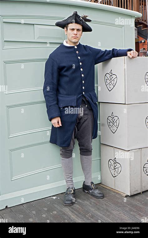 A Young Man In A Revolutionary War Costume Who Is A Tour Guide At The Boston Tea Party Museum In