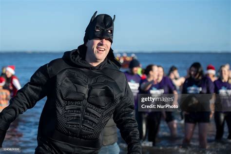 Annual Boxing Day charity dip in the North Sea at Redcar in England ...