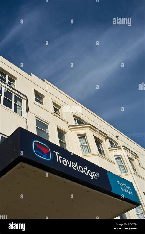 The facde and entrance to the Travelodge on Worthing seafront Stock ...