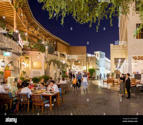 People in Souq Waqif, Doha, Qatar at night Stock Photo - Alamy